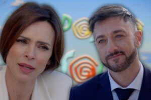 logo upas sullo sfondo e gennaro ed elena in primo piano