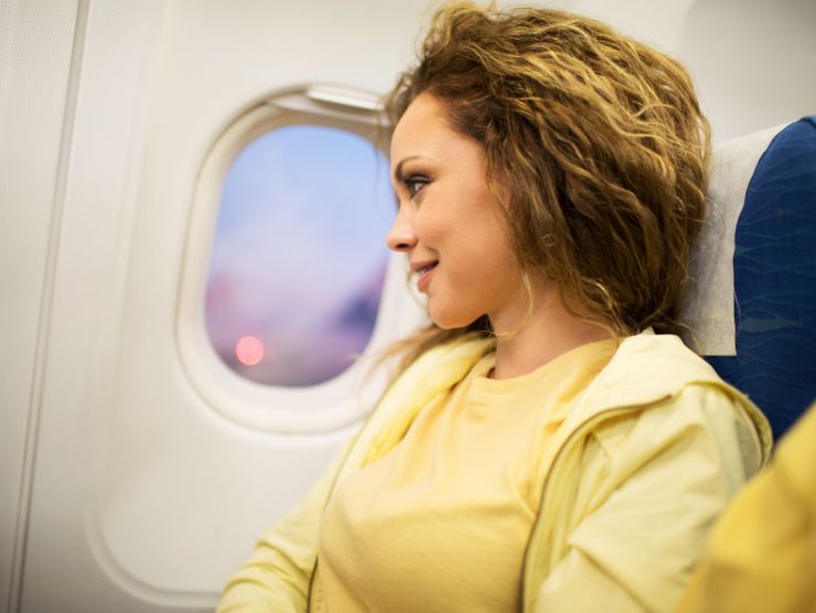 donna in aereo