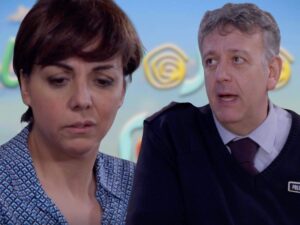logo upas sullo sfondo e guido e mariella
